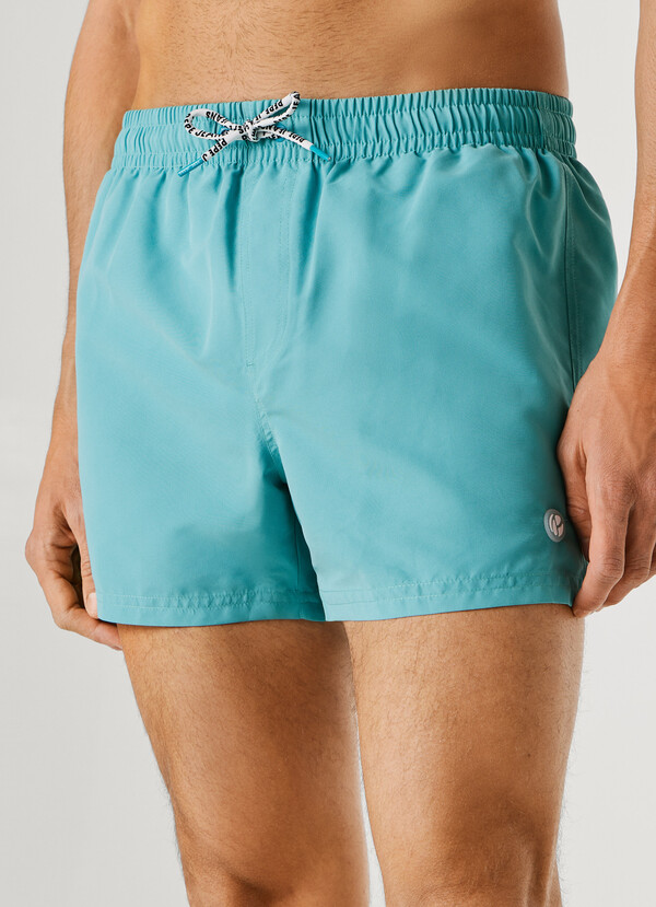 SWIM SHORTS WITH CIRCULAR LOGO