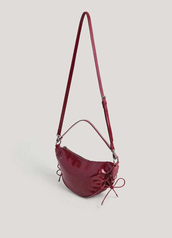 Leather effect crescent-shaped handbag