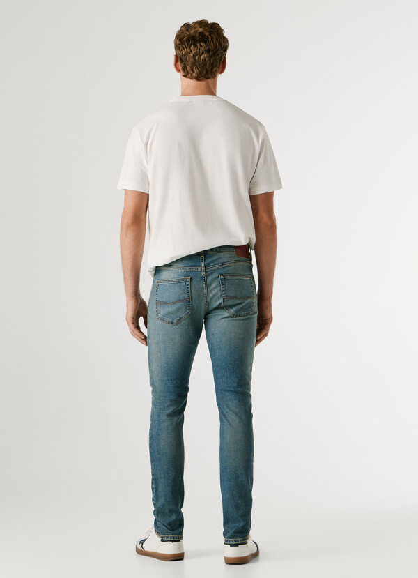 STANLEY- TAPER FIT MID-RISE JEANS