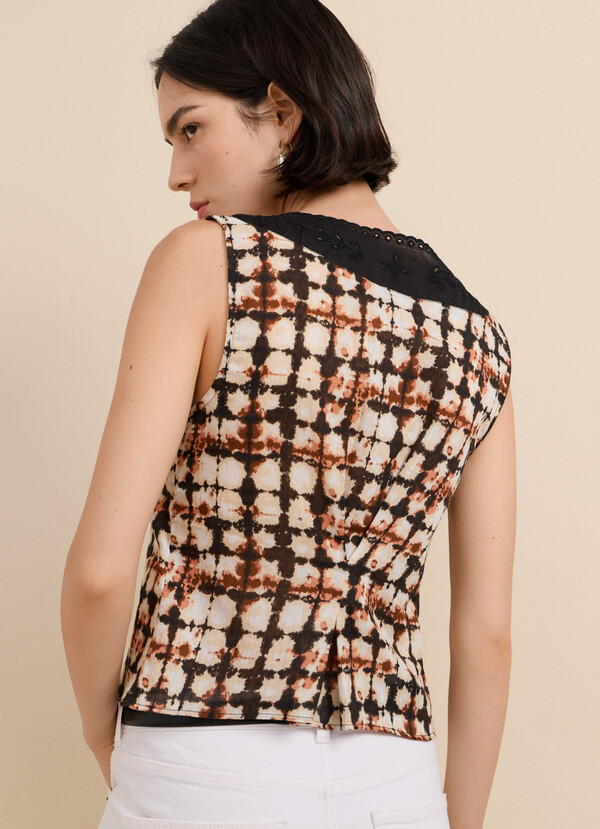 SLEEVELESS IKAT PRINT BLOUSE