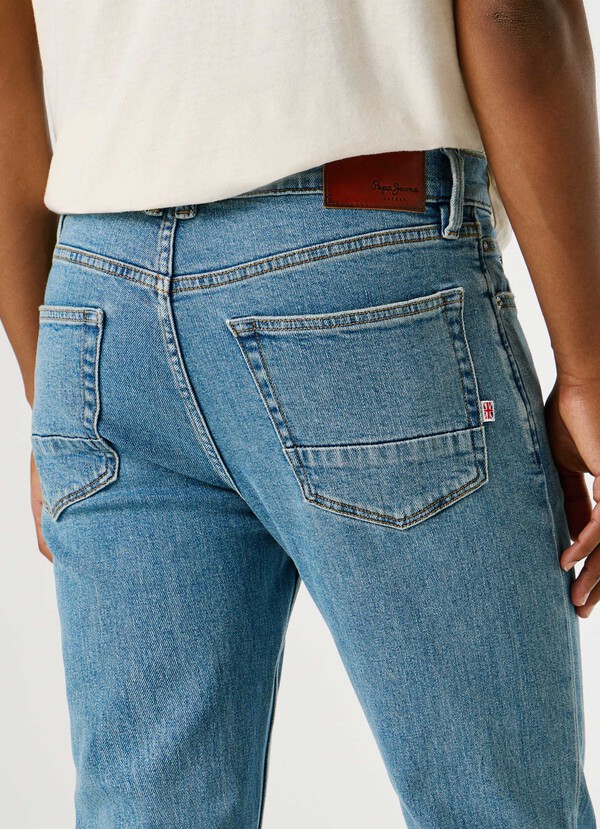 HATCH - SLIM FIT MID-RISE JEANS