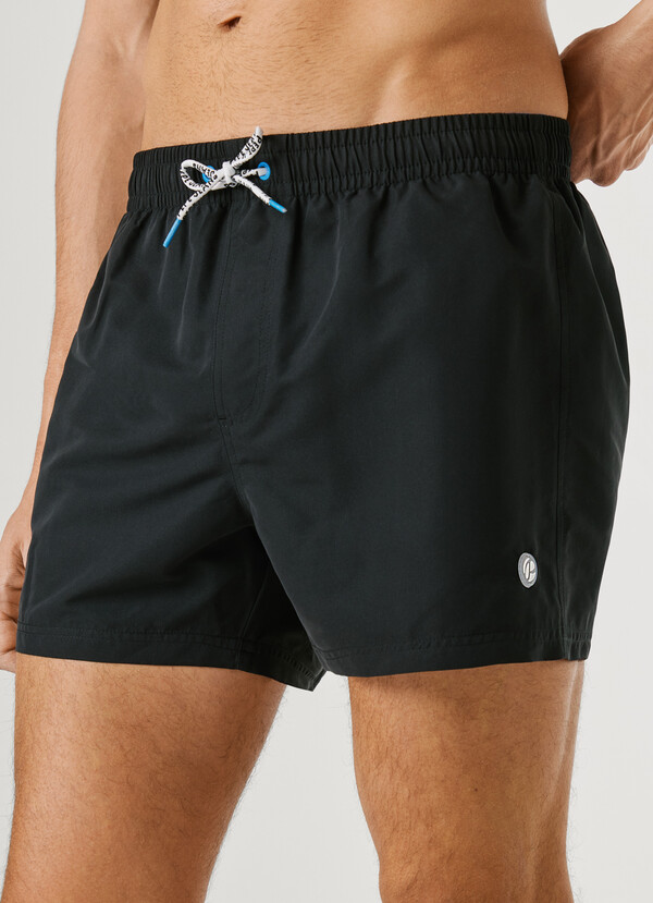SWIM SHORTS WITH CIRCULAR LOGO