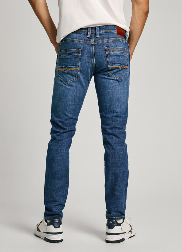 TAPER FIT MID-RISE JEANS - SPIKE