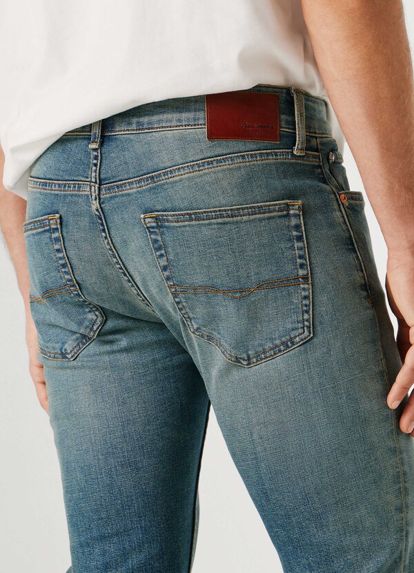 STANLEY- TAPER FIT MID-RISE JEANS