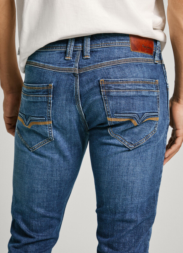 TAPER FIT MID-RISE JEANS - SPIKE