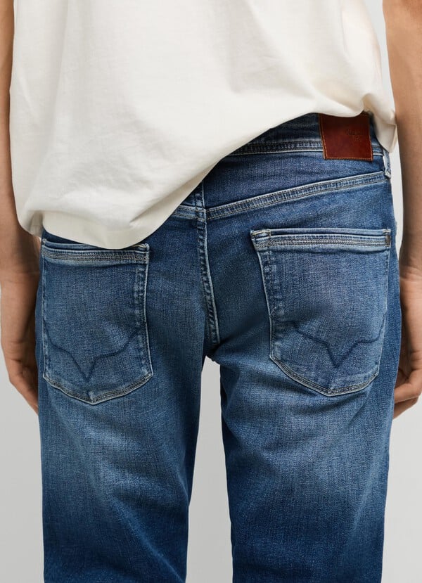 STANLEY - TAPER FIT MID-RISE JEANS
