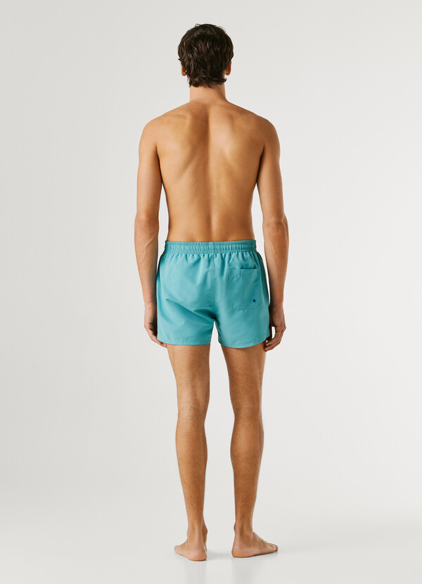 SWIM SHORTS WITH CIRCULAR LOGO