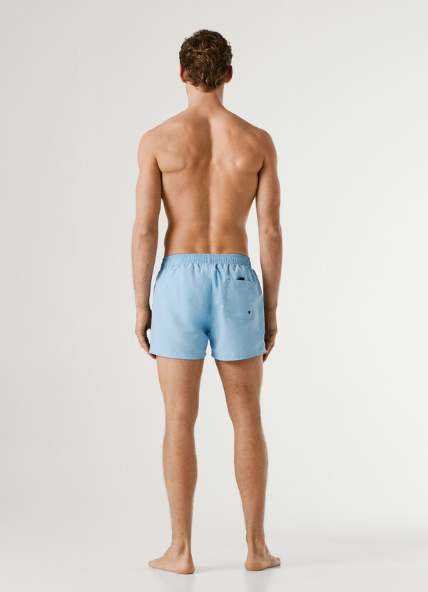 SWIM SHORTS WITH CIRCULAR LOGO