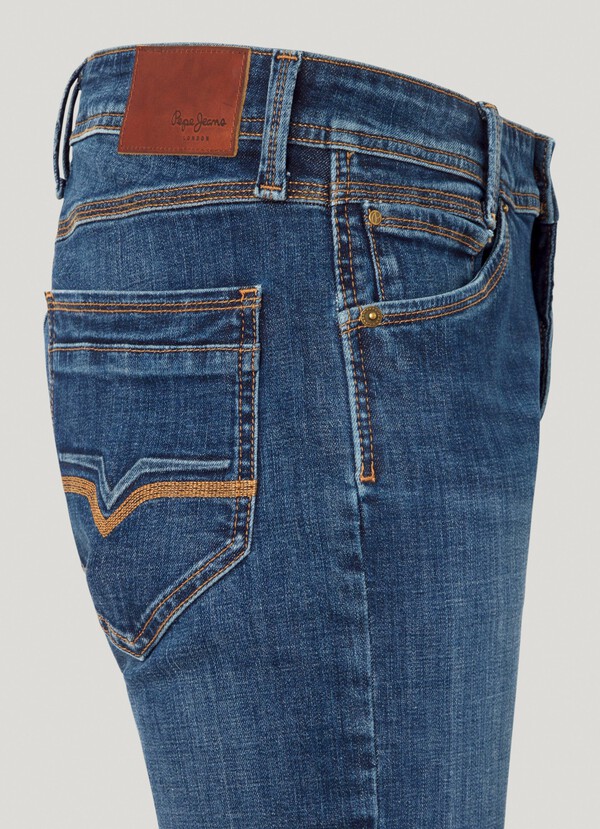 TAPER FIT MID-RISE JEANS - SPIKE