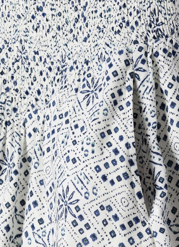 SHORT STRAPPY JUMPSUIT