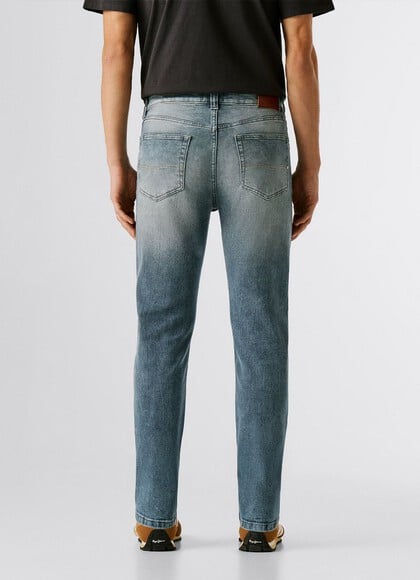 HATCH - SLIM FIT MID-RISE JEANS