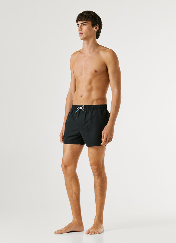 SWIM SHORTS WITH CIRCULAR LOGO