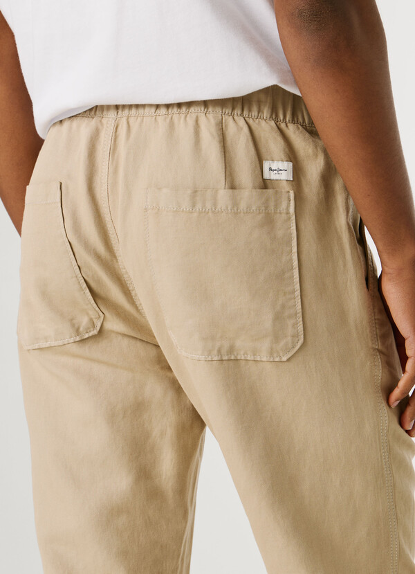 CHINO TROUSERS WITH ADJUSTABLE DRAWSTRING