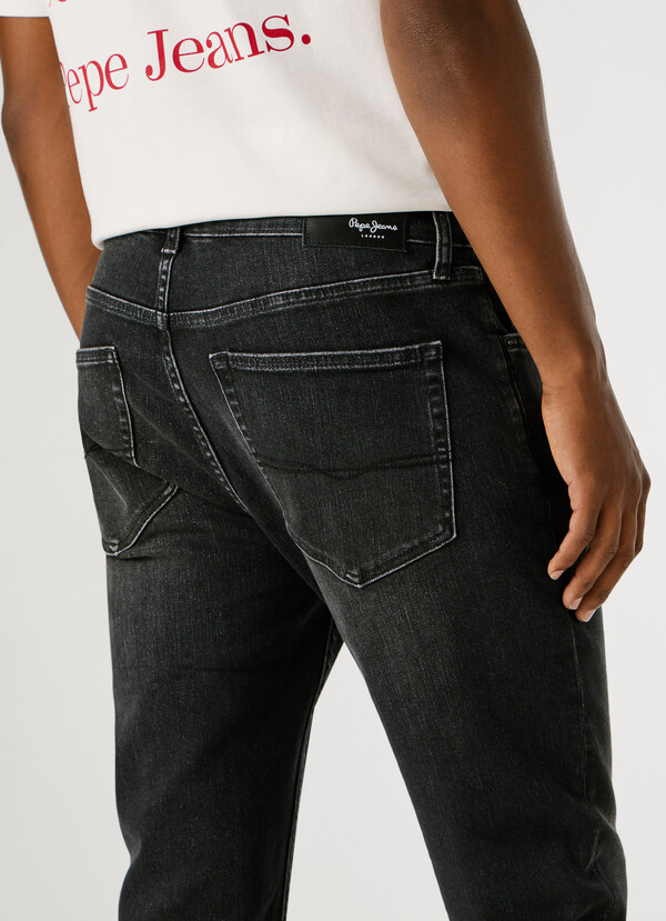 STANLEY - TAPER FIT MID-RISE JEANS