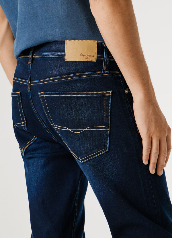TRACK- SLIM FIT MID-RISE JEANS